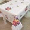 Біла ллянна скатертина з квітковою вишивкою